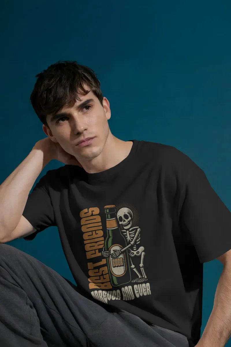 A man wearing a Black t-shirt with skeleton hugging beer bottle and Best Friends Forever and Ever text