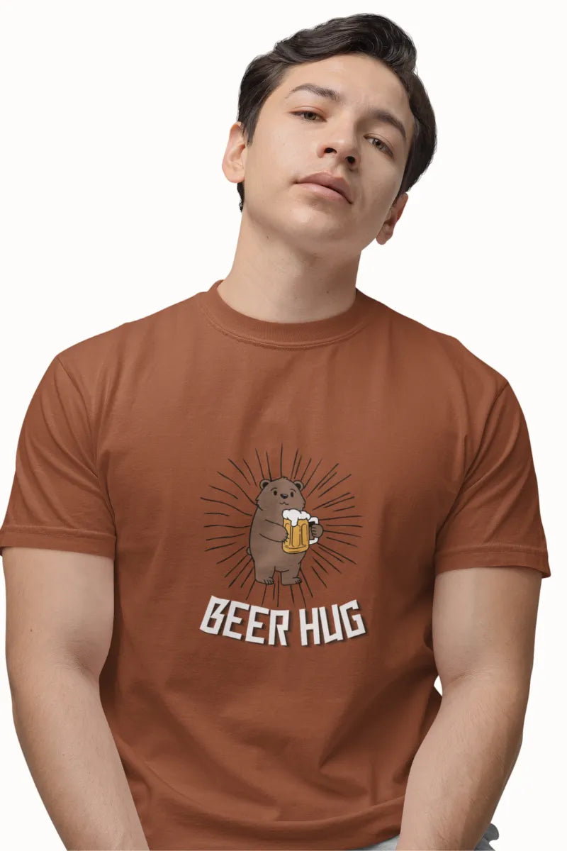 A man wearing a Rust brown T-shirt with 'Beer Hug' bear holding a beer mug illustration