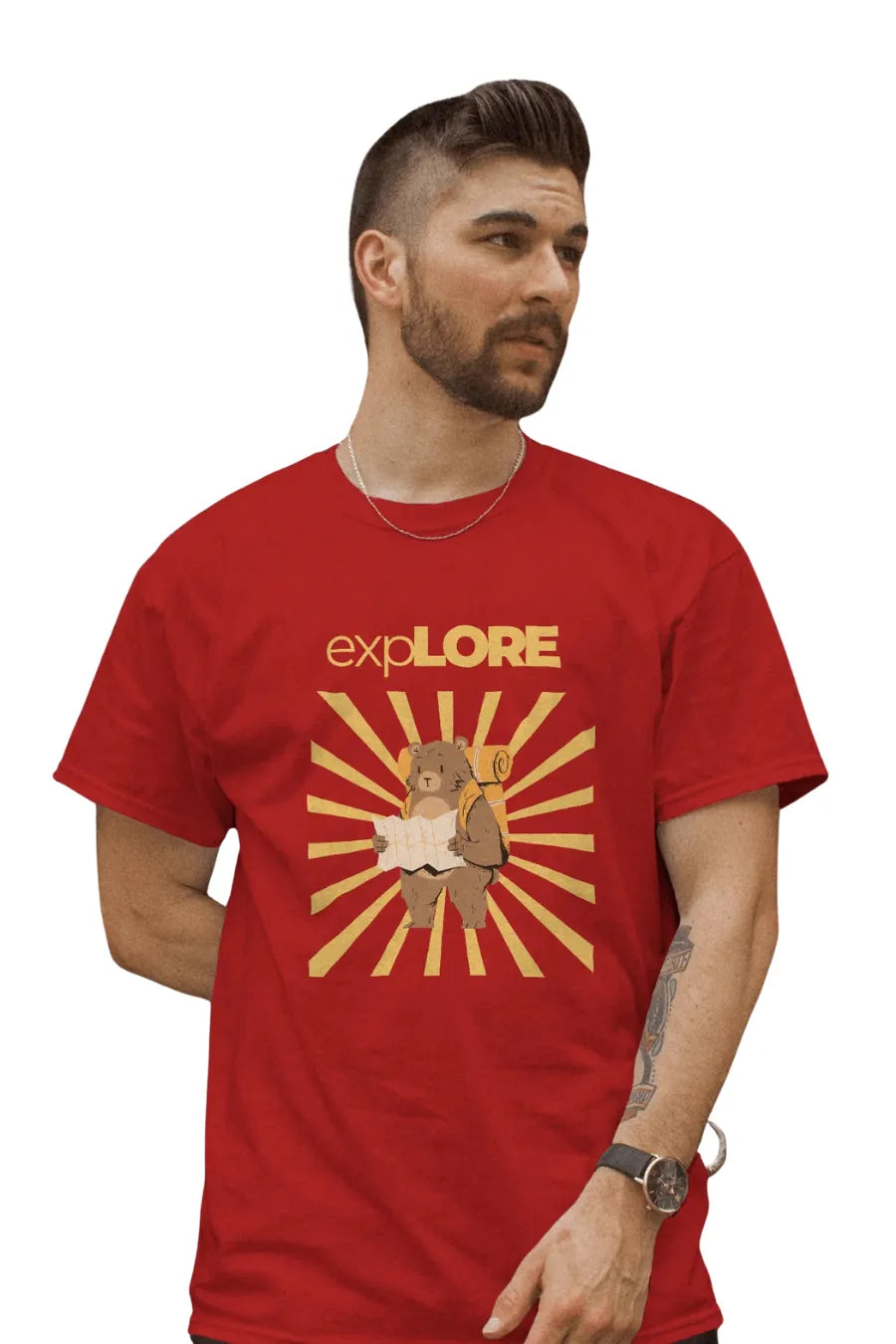 Man wearing a red T-shirt featuring a bear with a backpack and map under sunburst rays with 'Explore' text above.