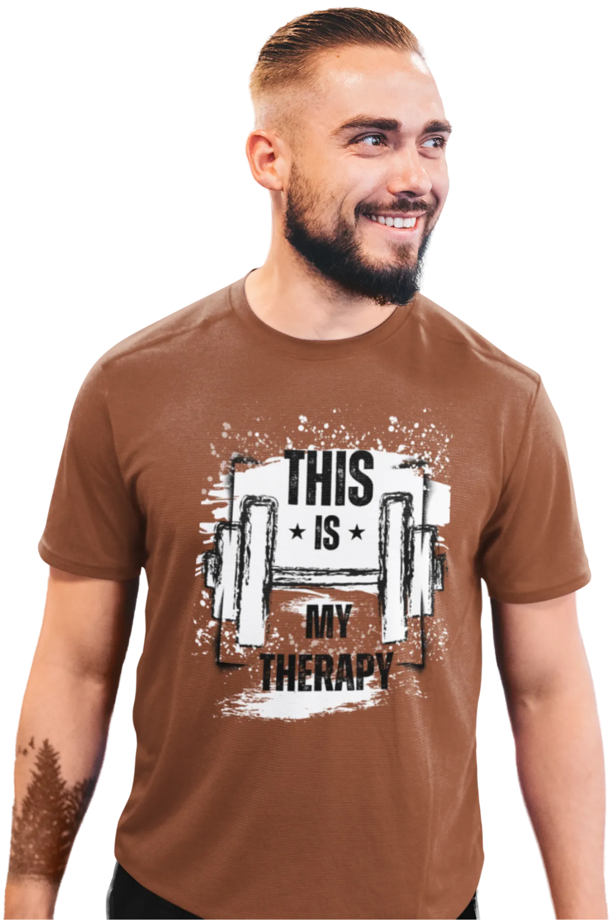 Man wearing rust brown cotton t-shirt with “This Is My Therapy” quote and barbell design, smiling confidently in a close-up view.