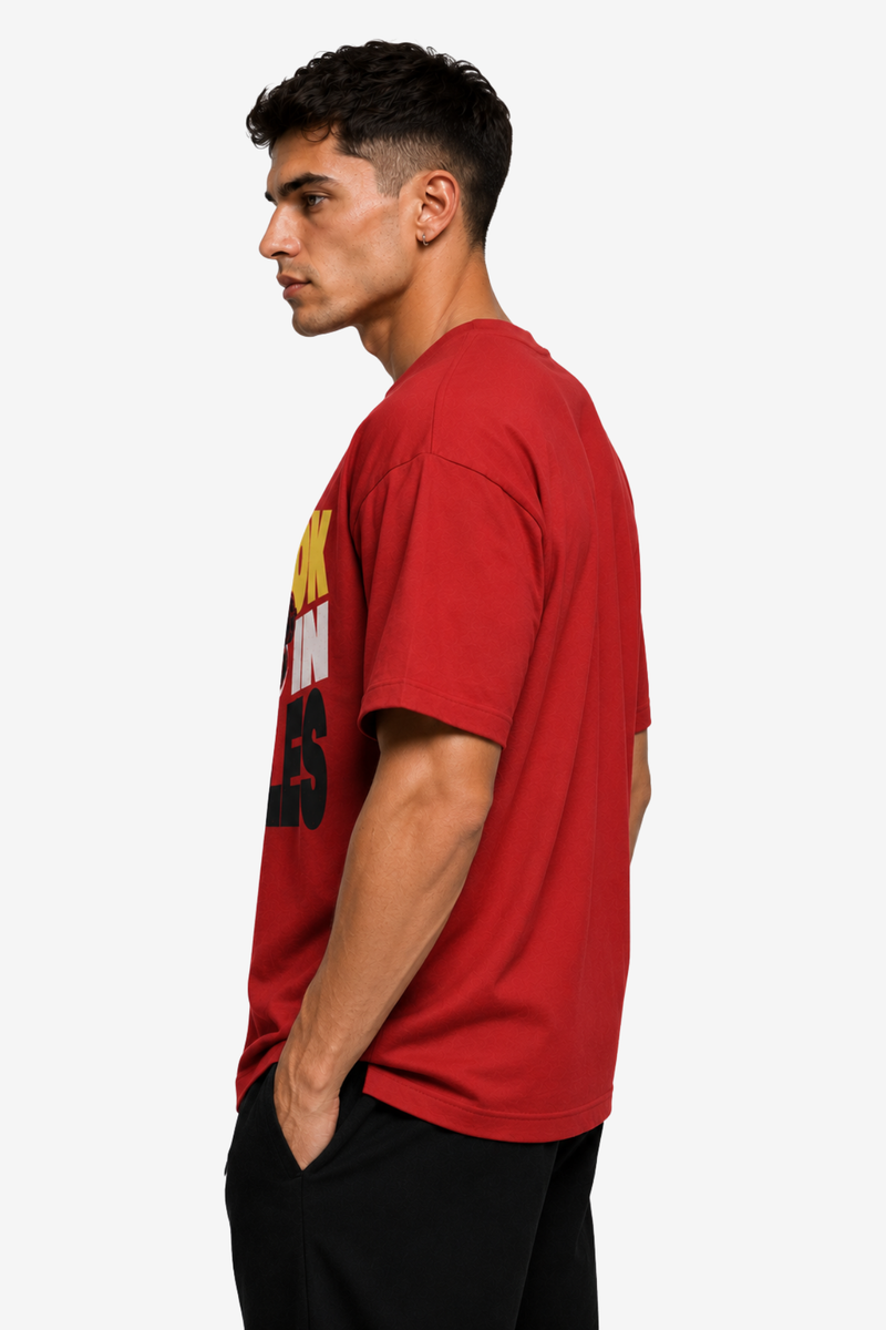 Red men’s T-shirt with You Look Good in Muscles gym quote and weightlifter artwork