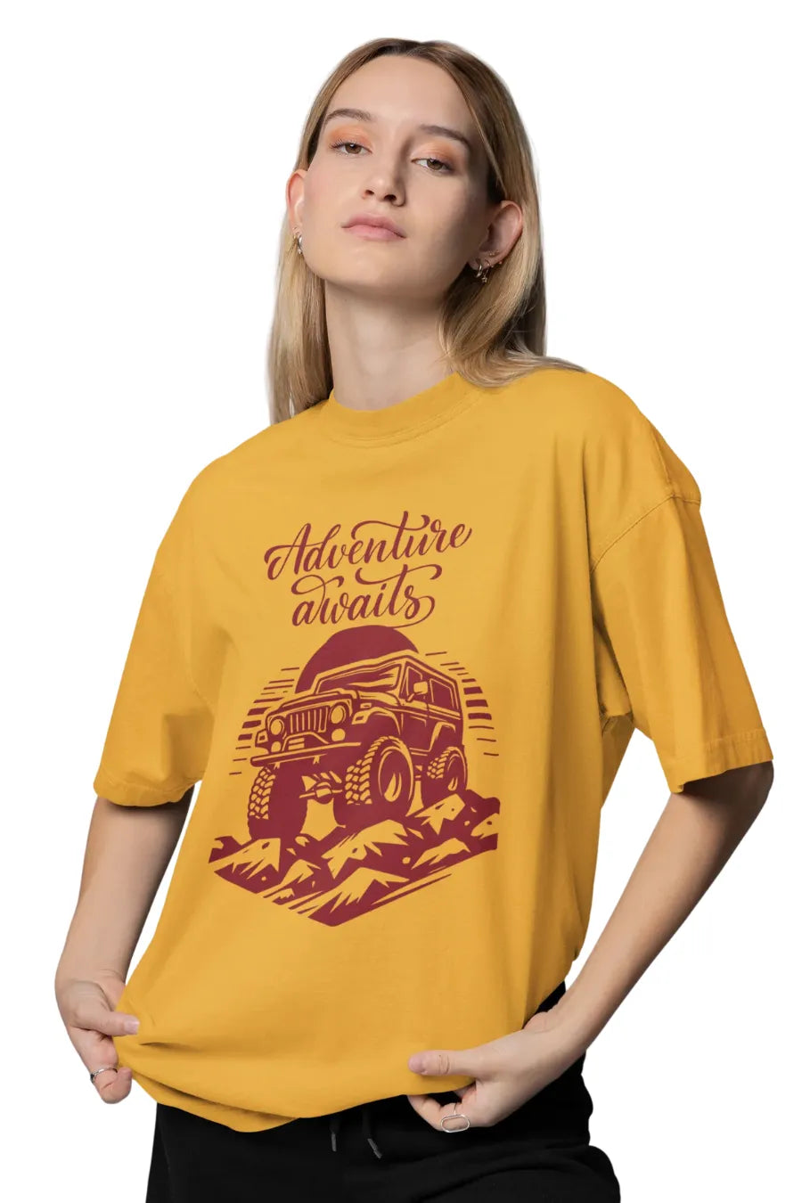 Mustard yellow oversized T-shirt with jeep and 'Adventure Awaits' text