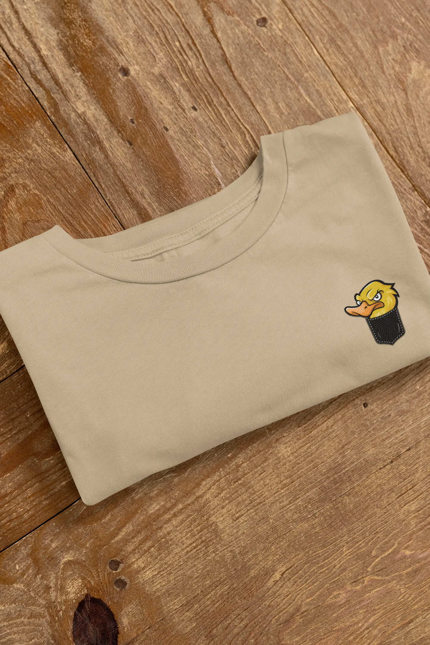 Angry Duck in Pocket Graphic T-Shirt – Cartoon Tee for Women