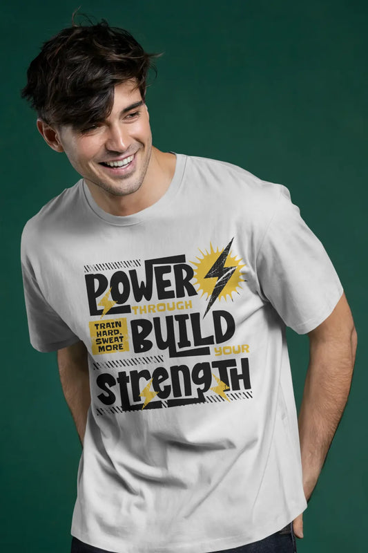 Man wearing off-white cotton t-shirt with “Power Through Build Strength” motivational gym quote and lightning bolt graphic printed on front.
