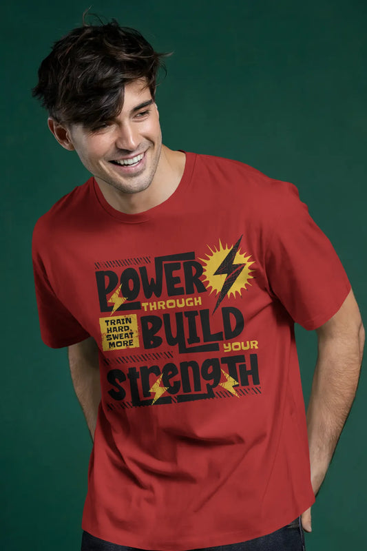 Man wearing a red t-shirt with the motivational quote “Power Through Build Your Strength – Train Hard, Sweat More” printed on the front in bold yellow and black.