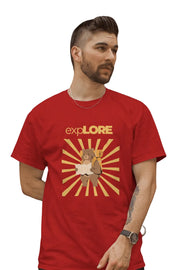 Man wearing a red T-shirt featuring a bear with a backpack and map under sunburst rays with 'Explore' text above.