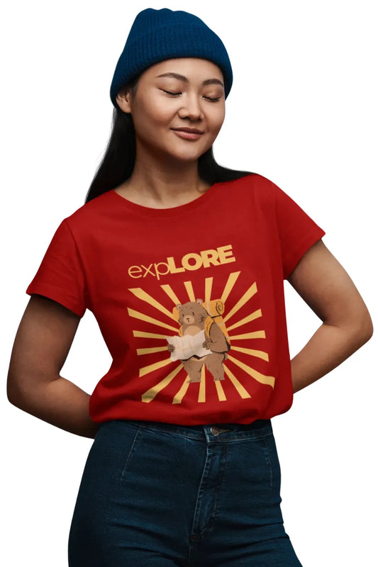 Woman wearing red relaxed fit t-shirt with explore print of a bear holding map and backpack