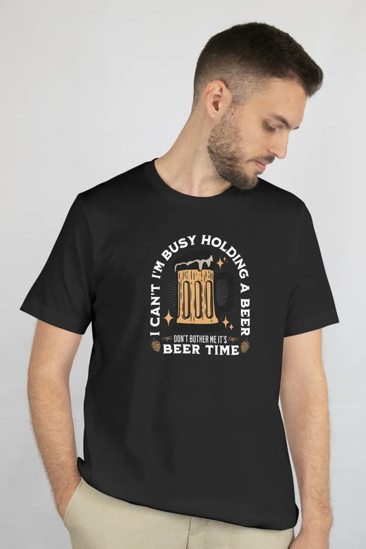 A man wearing a Black T-shirt with 'Busy Holding a Beer – Beer Time' quote and beer mug graphic