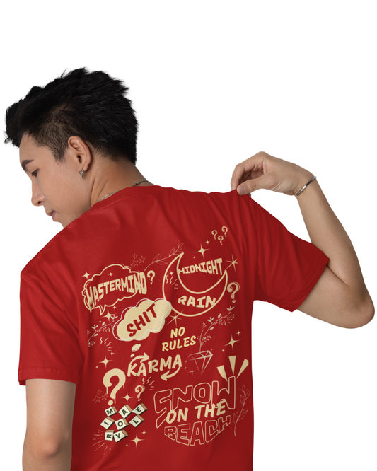 Man  wearing a red cotton t-shirt with quirky quotes and designs like “Midnight Rain,” “Karma,” “Snow on the Beach,” and “No Rules” printed on the back and front.