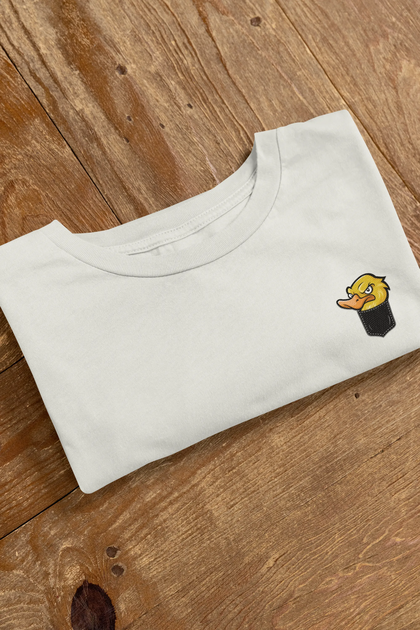 Angry Duck in Pocket Graphic T-Shirt – Cartoon Tee for Women