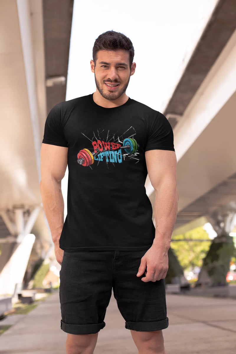 Man wearing a black cotton t-shirt with “Power Lifting” and barbell graphic printed across the chest. Design features cracked glass background. T-shirt has a regular and relaxed fit.