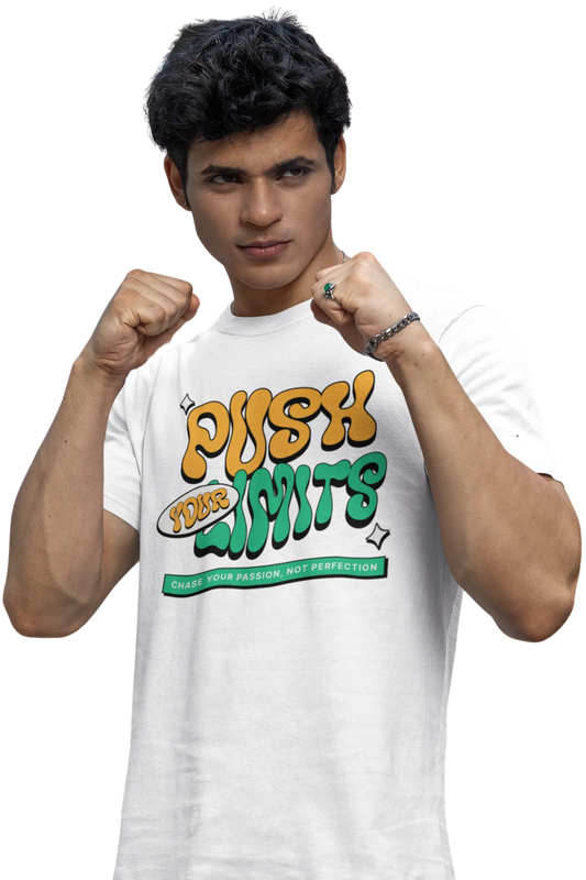 Man in off-white t-shirt with “Push Your Limits” quote in yellow and green bold font. Motivational cotton graphic tee.