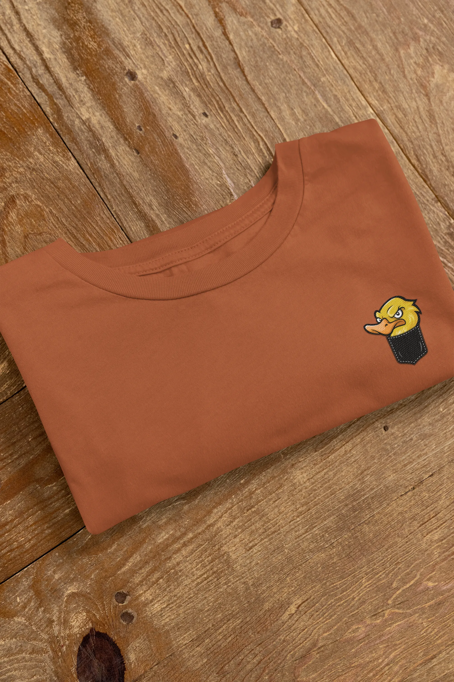 Angry Duck in Pocket Graphic T-Shirt – Cartoon Tee for Women