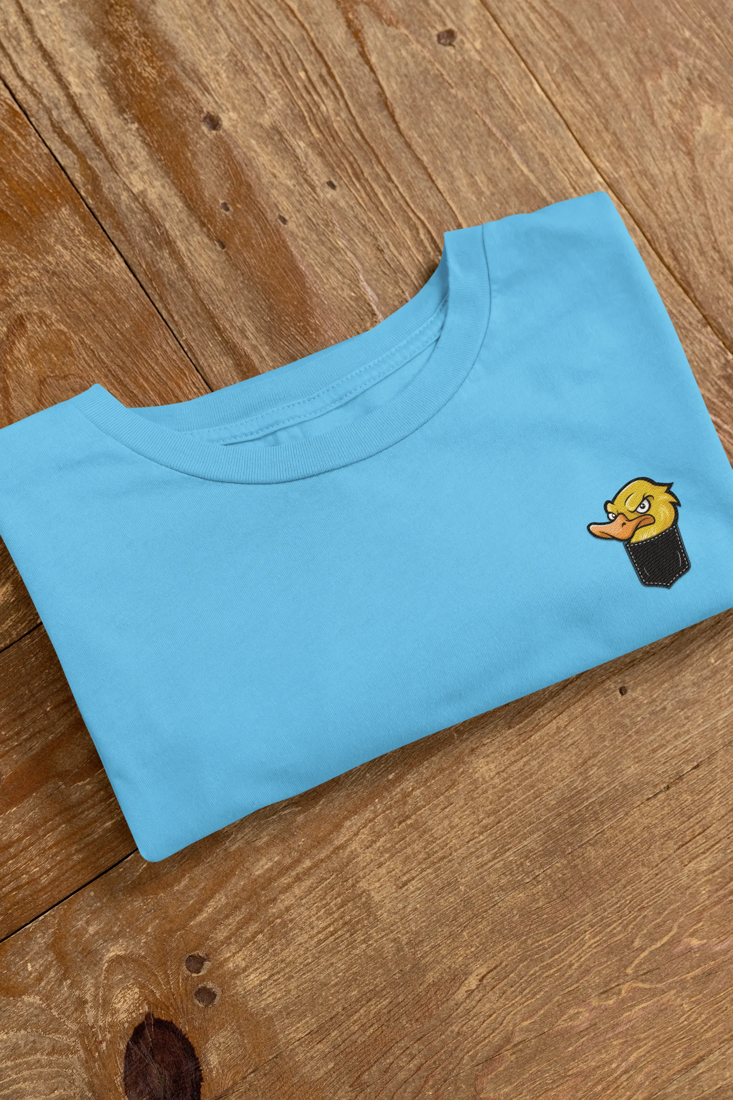 Angry Duck in Pocket Graphic T-Shirt – Cartoon Tee for Women