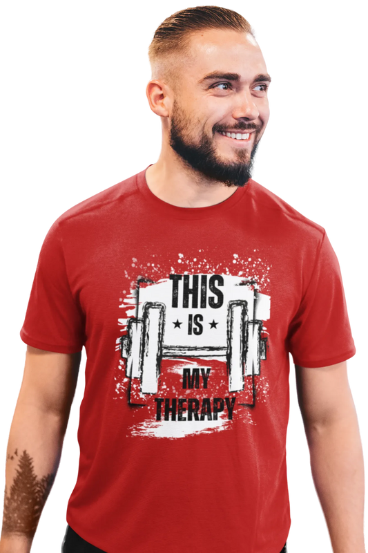 Man wearing a red cotton t-shirt with a graphic dumbbell design and the quote “This Is My Therapy” printed in bold black and white.