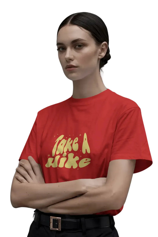 Woman in red oversized t-shirt with yellow text saying 'Take a Hike'