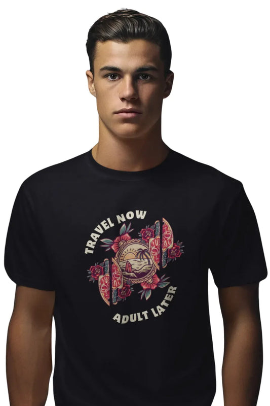 Man wearing a Black T-shirt with 'Travel Now Adult Later' graphic design featuring sunset, waves, and floral elements
